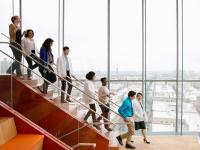 Columbia University medical students walk in the Vagelos Education Center.
